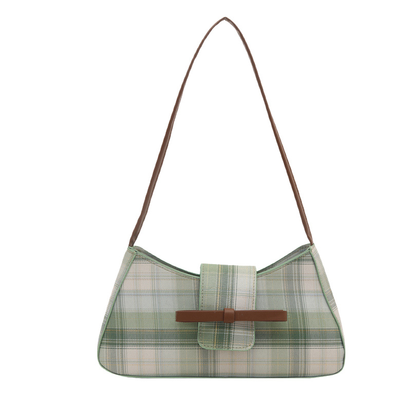 Moda personalidad hermosa versión coreana del bolso de la axila del palo francés 2025 lazo femenino moda nuevo bolso a cuadros de un solo hombro