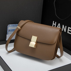 クロスボーダー爆型バッグ女性2025新型潮真皮豆腐バッグ高級感手こすり柄シングル肩斜め掛け小角バッグ