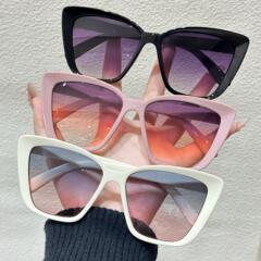 猫の目のサングラスの外国貿易の卸売りの全枠の黒色のメガネの男女の同項のサングラスの高級感のサングラスは紫外線を防ぎます。