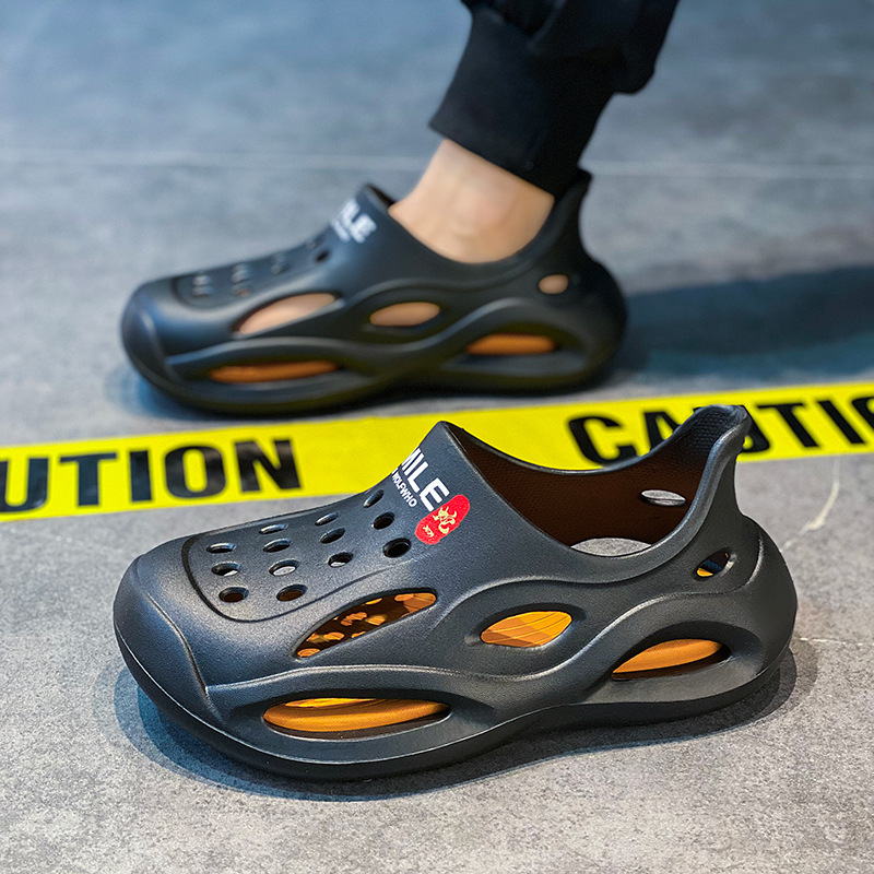 Pareja casual zapatos de playa nuevos hombres y mujeres de suela gruesa zapatillas Baotou sandalias de suela blanda zapatillas de verano zapatos con agujeros para el cabello