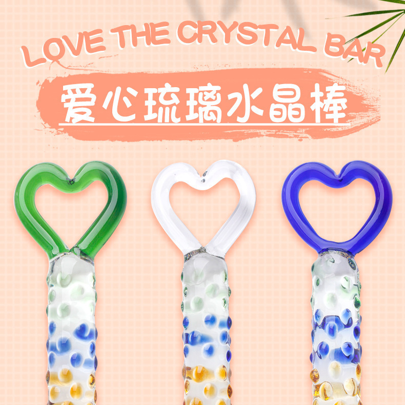 Glass Anal Plug with Heart-Shaped Pull-Tab, Raised Points and Textured Shaft, Transparent Pink — detail image 1