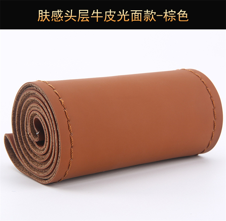 Skin-feeling top layer cowhide hand-stitched steering wheel cover four seasons universal leather car handle cover new leather cover