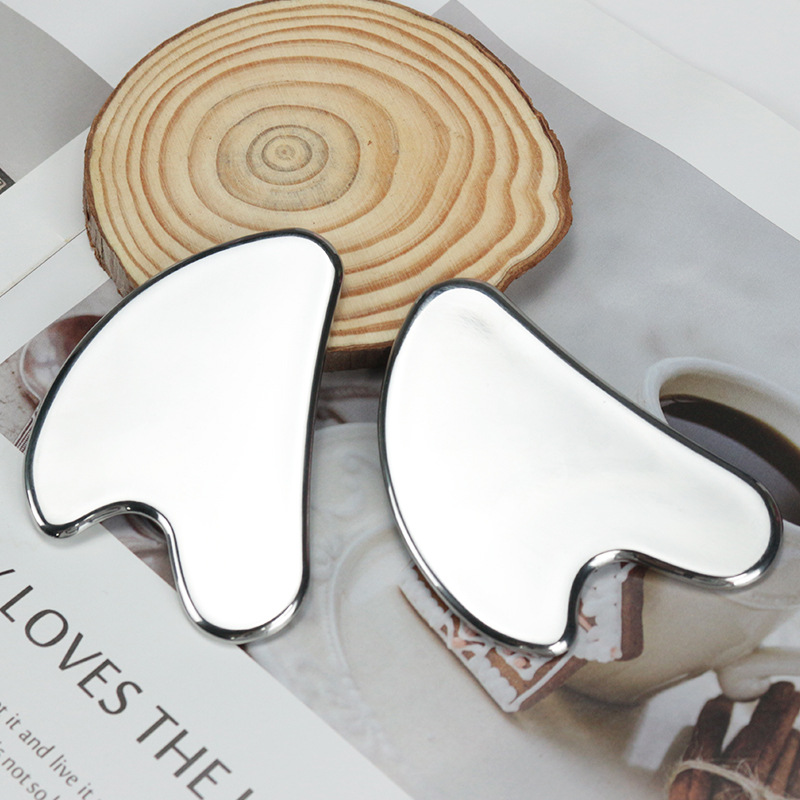 Nuevo en forma de corazón 304 de acero inoxidable raspado tablero facial especial belleza facial amor masajeador Meridian raspado pieza