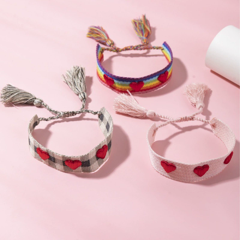 Новый европейский и американский плетеный браслет с вырезом в форме сердца, регулируемый ремешок на запястье, брелки ручной работы с кисточками