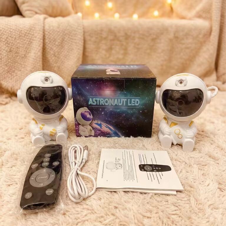 Cross-border astronaut starry sky projection night light, dynamic ambiance light, water wave USB astronaut star projector