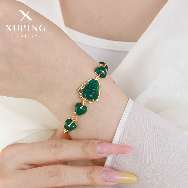 Pulsera Xuping de aleación con baño de oro de 24k, decoración de corazón de esmeralda, estilo chino, joyería de nicho con temperamento.