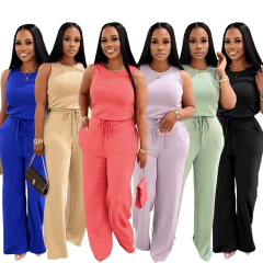 TW728夏の新型は欧米のファッションに合わせて痩せているカジュアルな女性の袖なしのストラップの純色の通勤連体ズボンです。