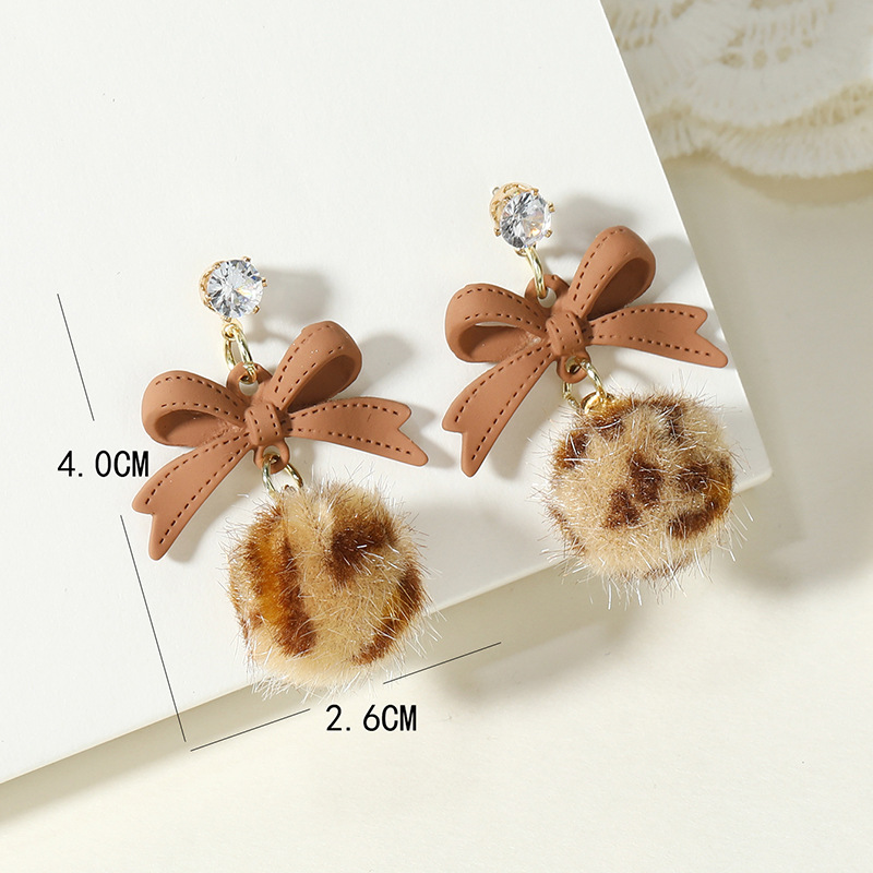 Korean version of the fashion autumn and winter new bow leopard hair ball earrings simple retro niche creative earringspicture2