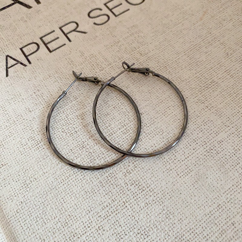 Pendientes de metal transfronterizos de otoño e invierno con aguja de plata, pendientes, pendientes de viento frío de moda de nicho, pendientes de lujo de alta gama de luz de todo fósforo