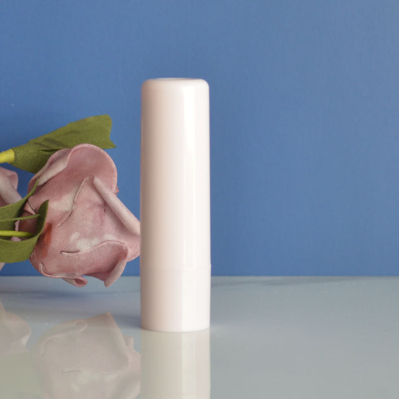En stock 5g Rosa Blanco bálsamo labial tubo de plástico lápiz labial tubo de esmalte de labios blanco brillante botella 19*69m