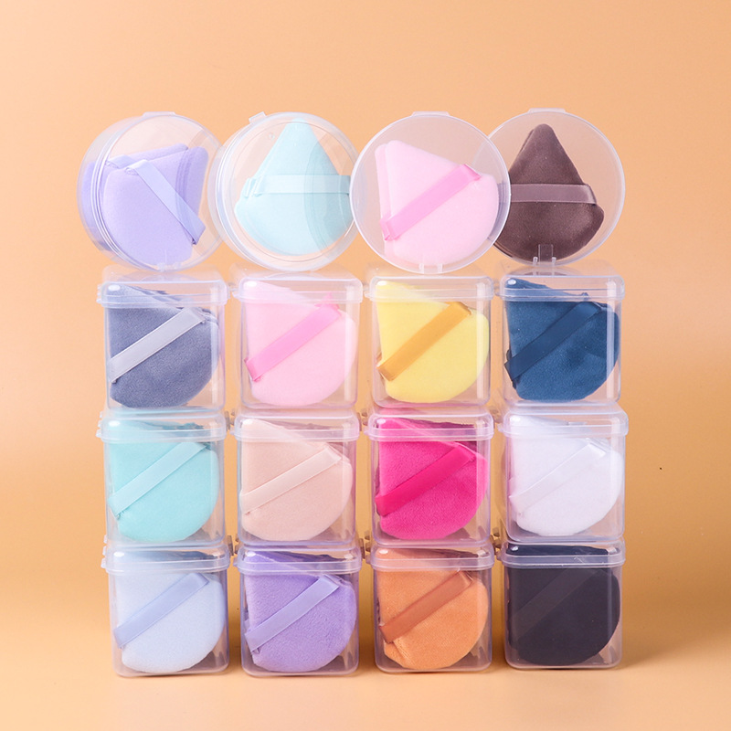 Mini-transfronterizas pequeño triángulo soplo maquillaje suelto soplo de maquillaje esponja polvo polvo cojín de aire de dedo al por mayor soplo de flocado