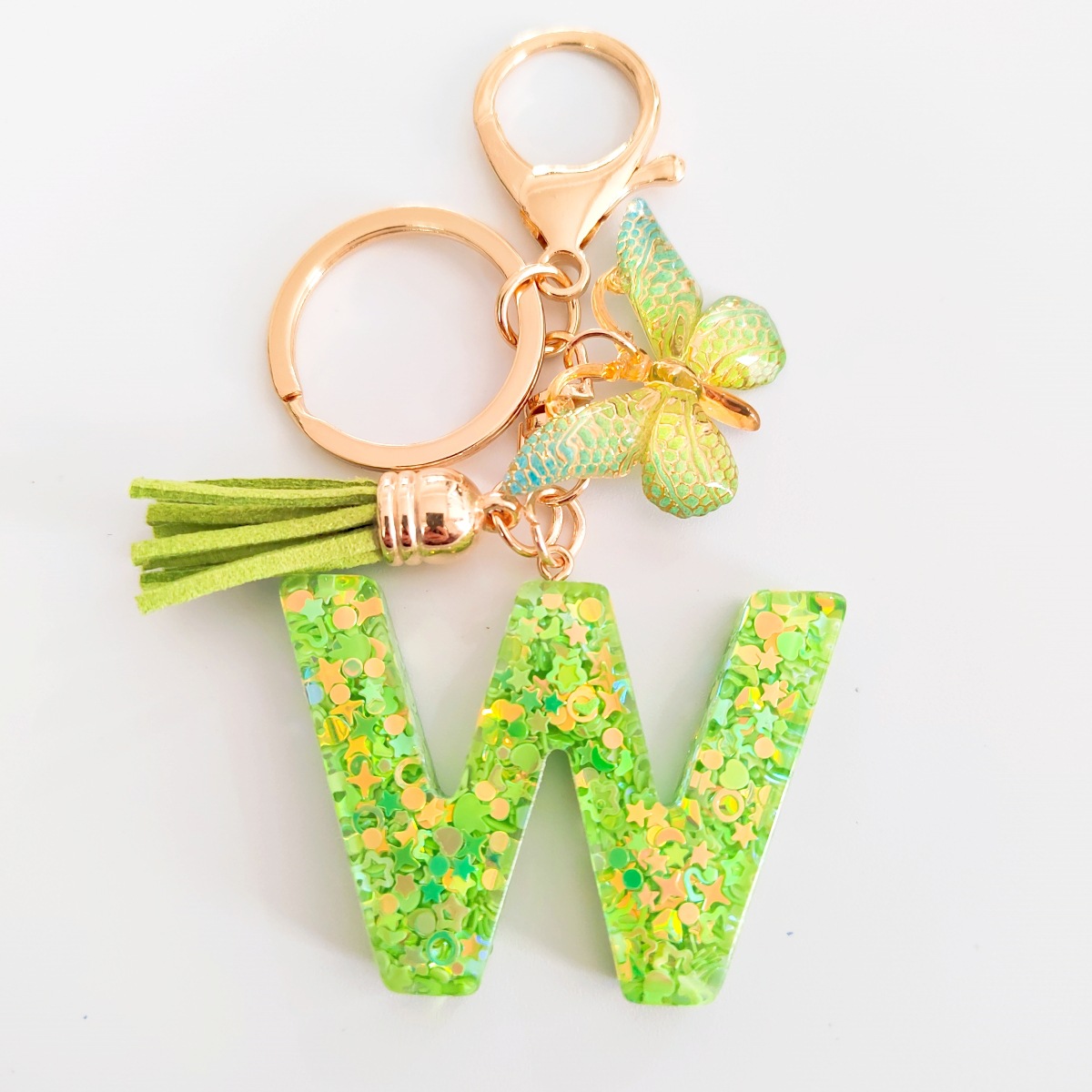 26 letras inglesas llavero colgante estrella verde brillo gota resina colgante llavero de personalidad europea y americana