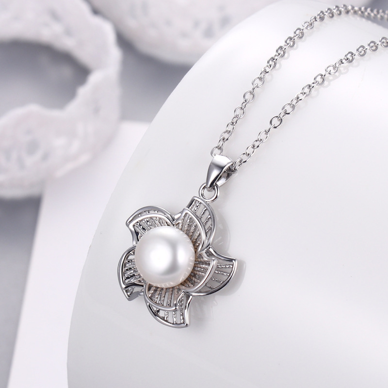 in stock Korean version of the net red live supply hollow sun flower freshwater pearl pendant female manufacturers wholesale supply