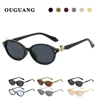 Queen Mother-in-Civilian Saturn street shot sunglasses Y2K