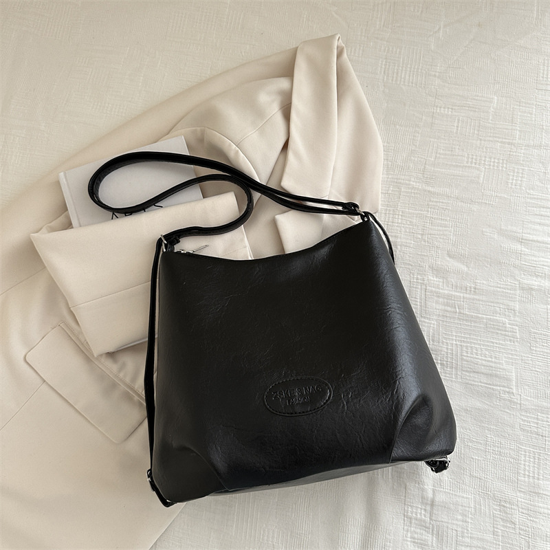 Gran capacidad de transporte popular ocio 2024 retro nuevo estilo de tendencia de color sólido multifuncional bolso de hombro para mujer