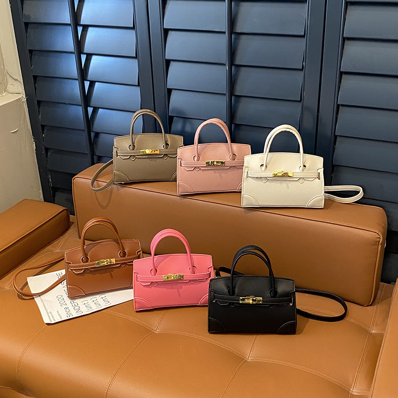 Coreano simple color sólido bolso de hombro para niños y niñas pequeño mini bolso de mano bebé nuevo bolso de comercio exterior transfronterizo para niños