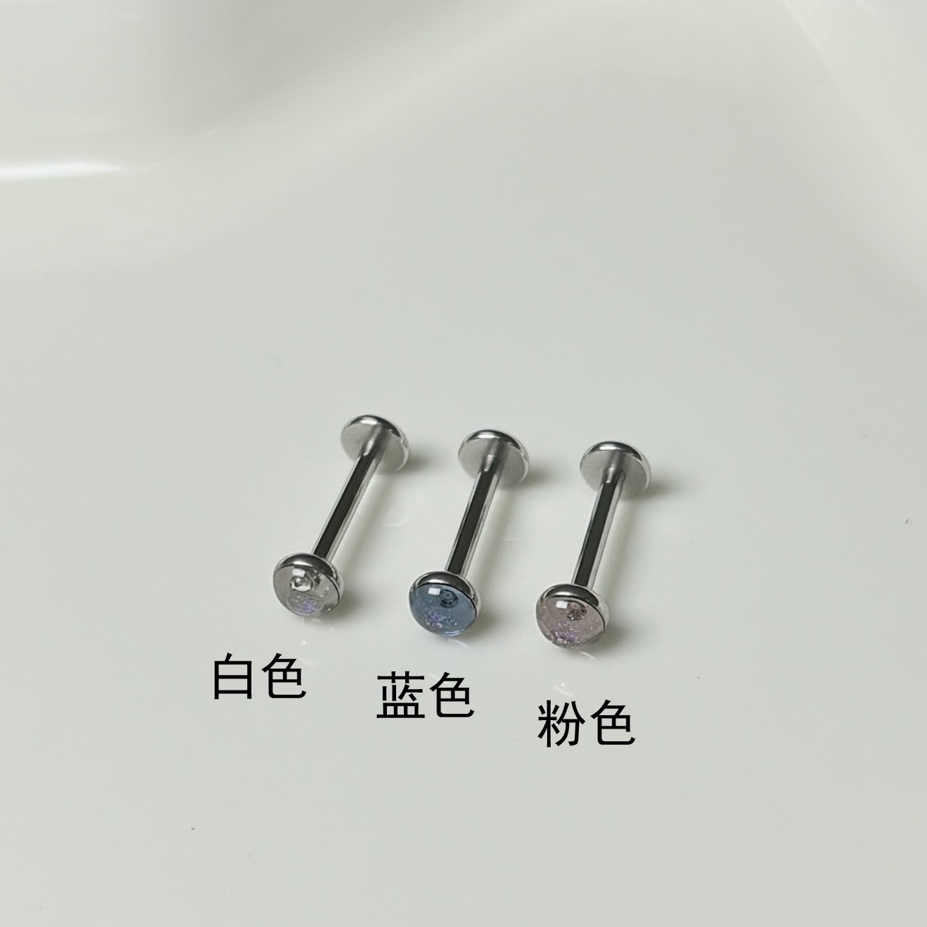 Silver pointed spike labret stud material detail