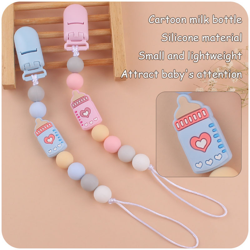 Nuevo bebé suministros clip de plástico de color calmante bebé de dibujos animados biberón de silicona mordedura pezón cadena anti-caída