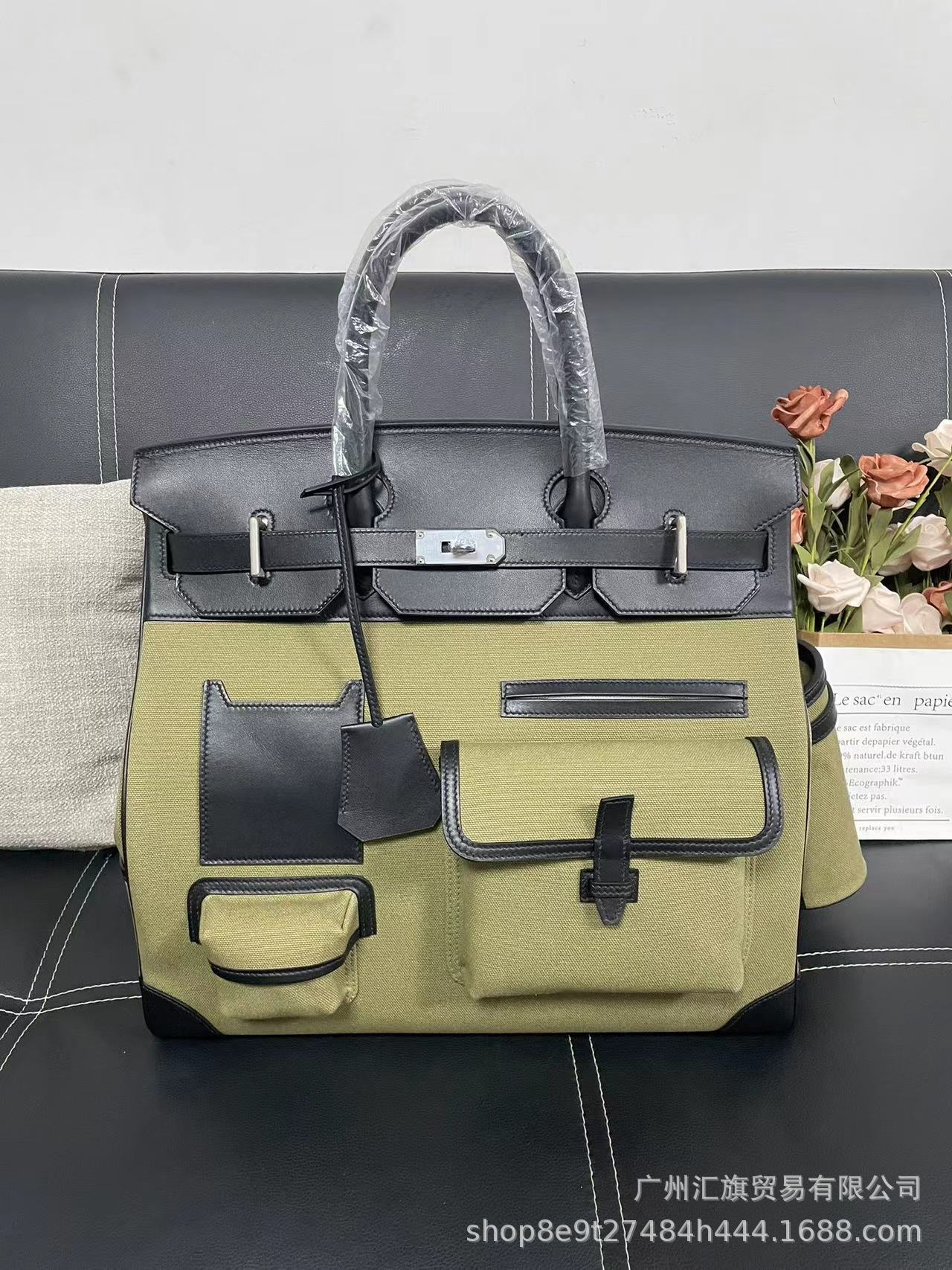 Bolsa de platino directa de fábrica Hac40 bolsas de viaje de color blanco y negro de gran capacidad pulsera de cuero de vaca real de hilo portátil