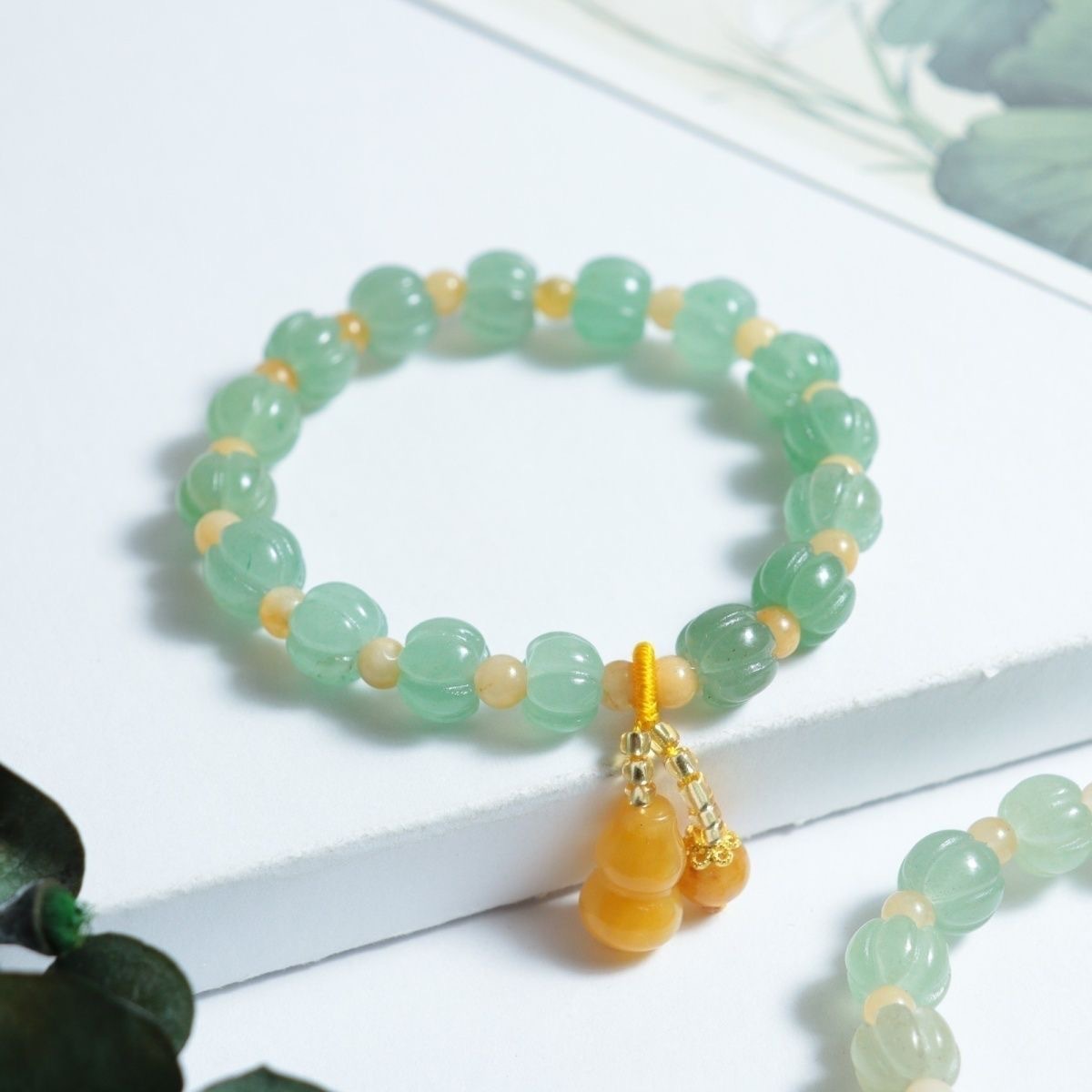 Tianshan al por mayor calabaza verde oro jade pulsera puls