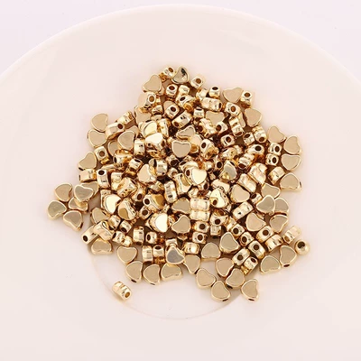 Zərgərlik ara hissələri Spacer Beads with Horizontal Holes Heart-Shaped - gold-67mmpack-of-200