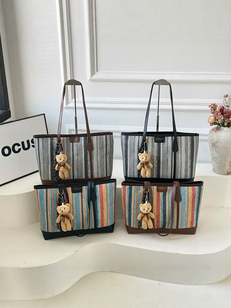 2026 nueva bolsa de tejido de gran capacidad de viaje mochila de hombro universal bolso coreano osos colgante moda