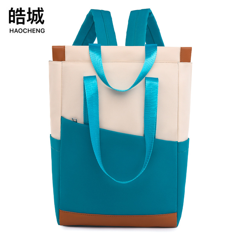 Comercio exterior 2023 nuevas damas casuales mochila de tela Oxford moda contraste color computadora de gran capacidad mochila portátil marea