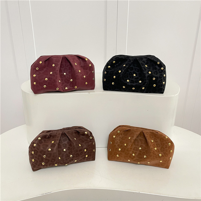 Bolsas populares transfronterizas para mujeres 2025, bolsas de nuevo estilo, bolsas de remaches, bolsas de mano, bolsas de nicho de diseño