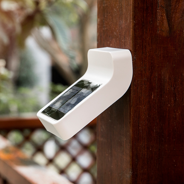 Cross-border solar wall lamp 4LED home garden fence light outdoor waterproof solar outdoor light