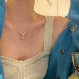 福字珍珠项链女2023年新款轻奢小众设计高级感毛衣链锁骨链颈链