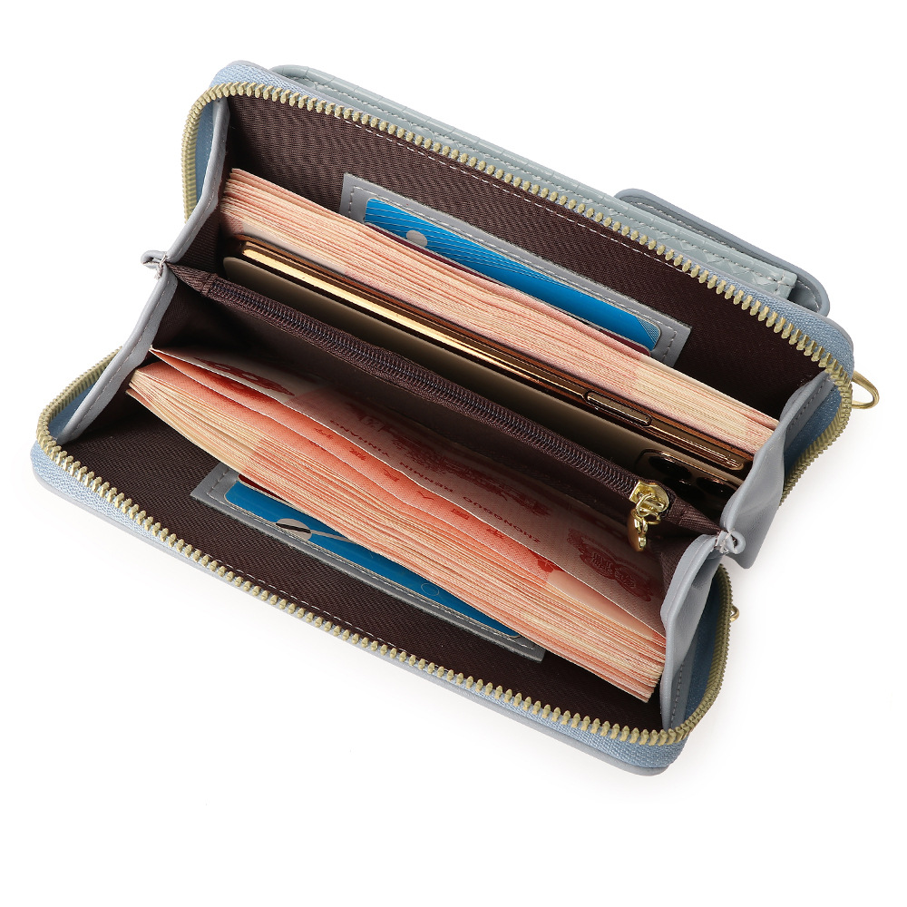 Bolsa de nicho de gama alta para mujeres 2023 nueva cartera de moda patrón de serpiente hombro bolsa de mensajero todo a juego ins bolsa de teléfono