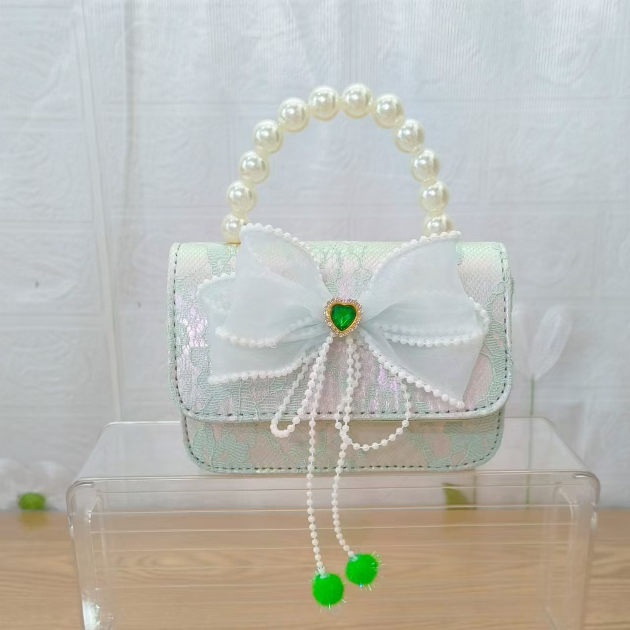 Bolsa de arco princesa bolso de perlas bolso de mano cadena bolso de cinturón pequeño viento bolso de niñas bolso de regalo del día de los niños bolso pequeño