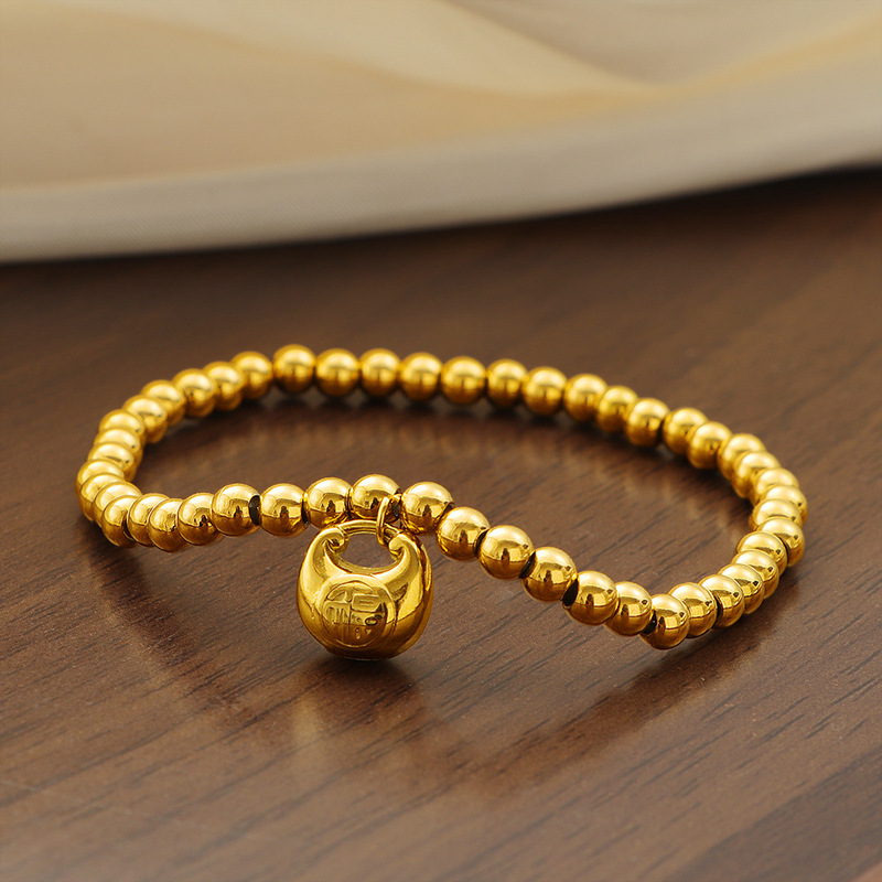 New Chinese Style Chubby Fuzhu Beads Spring Rope Titanium Steel Golden Fufu Bag Bracelet for Women Transporter New Year High-end Gift for Women