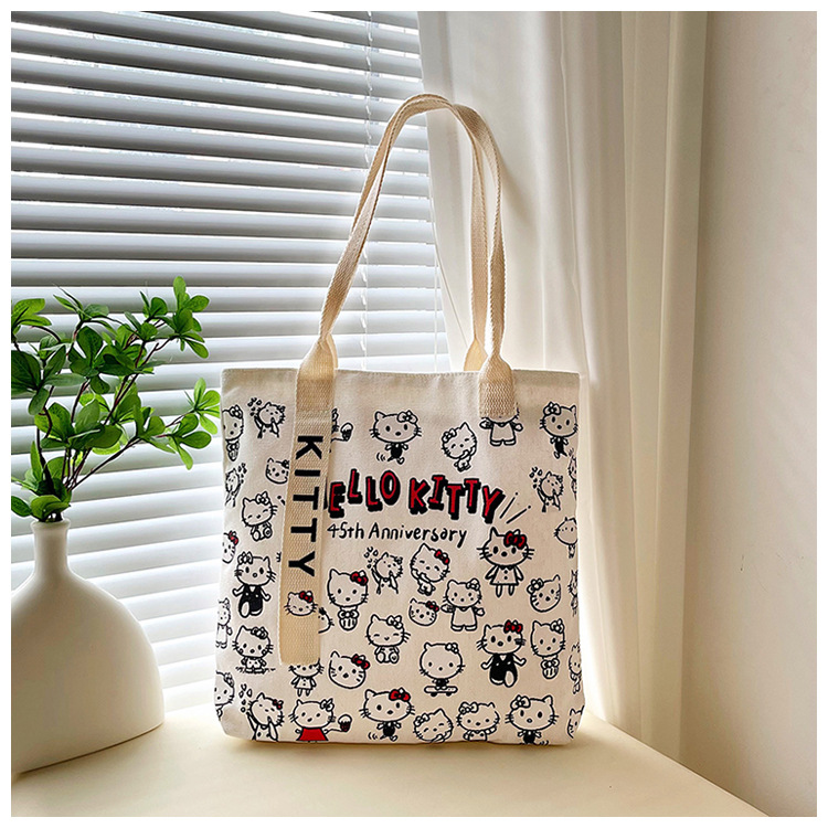 The new fashionable cartoon canvas bag, simple and versatile tote bag, cute commuting single-shoulder tote large bag, is selling well across borders undefined