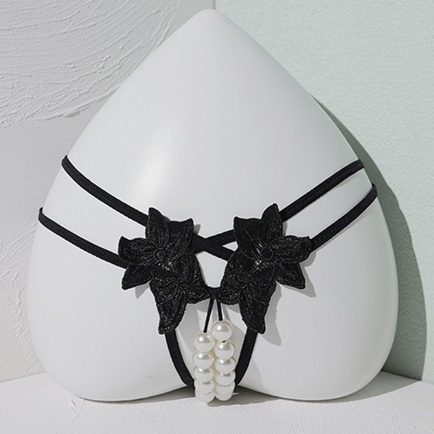 Nueva ropa interior sexy de gran tamaño para mujer entrepierna abierta sin tirarse doble fila de tanga de masaje de perlas sexy caliente Europa y América T