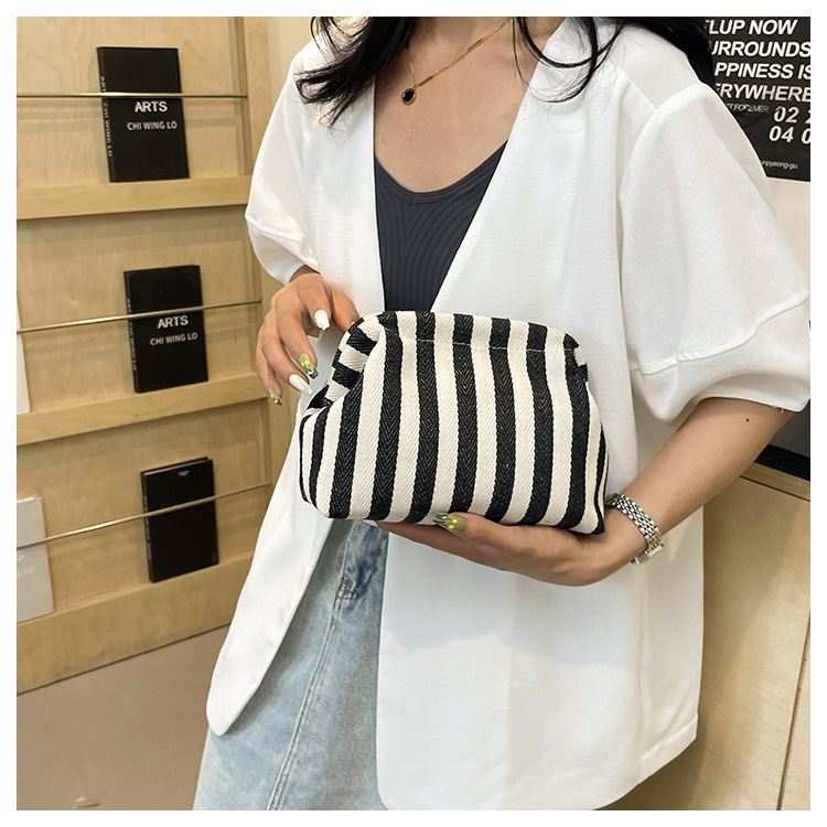 New cross-border fashion color-blocking striped cosmetic bag, women's loose change mobile phone storage bag, trendy and niche cloud clutch undefined