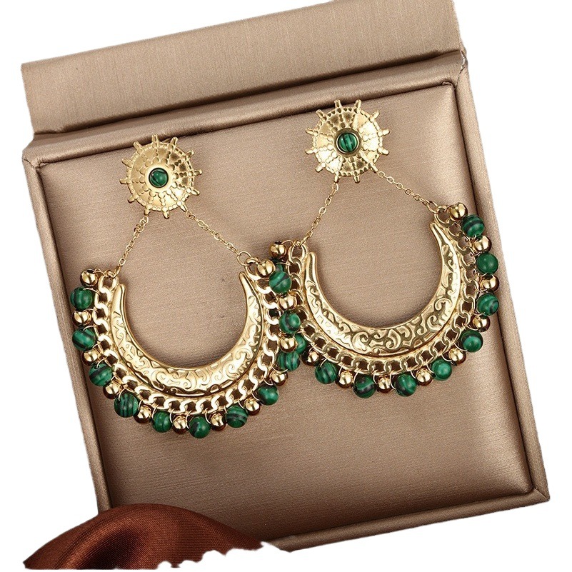 Joyería de xupe moda europea y americana retro estilo étnico hueco pendientes de ventilador hembra Bohemia borla joyería del oído