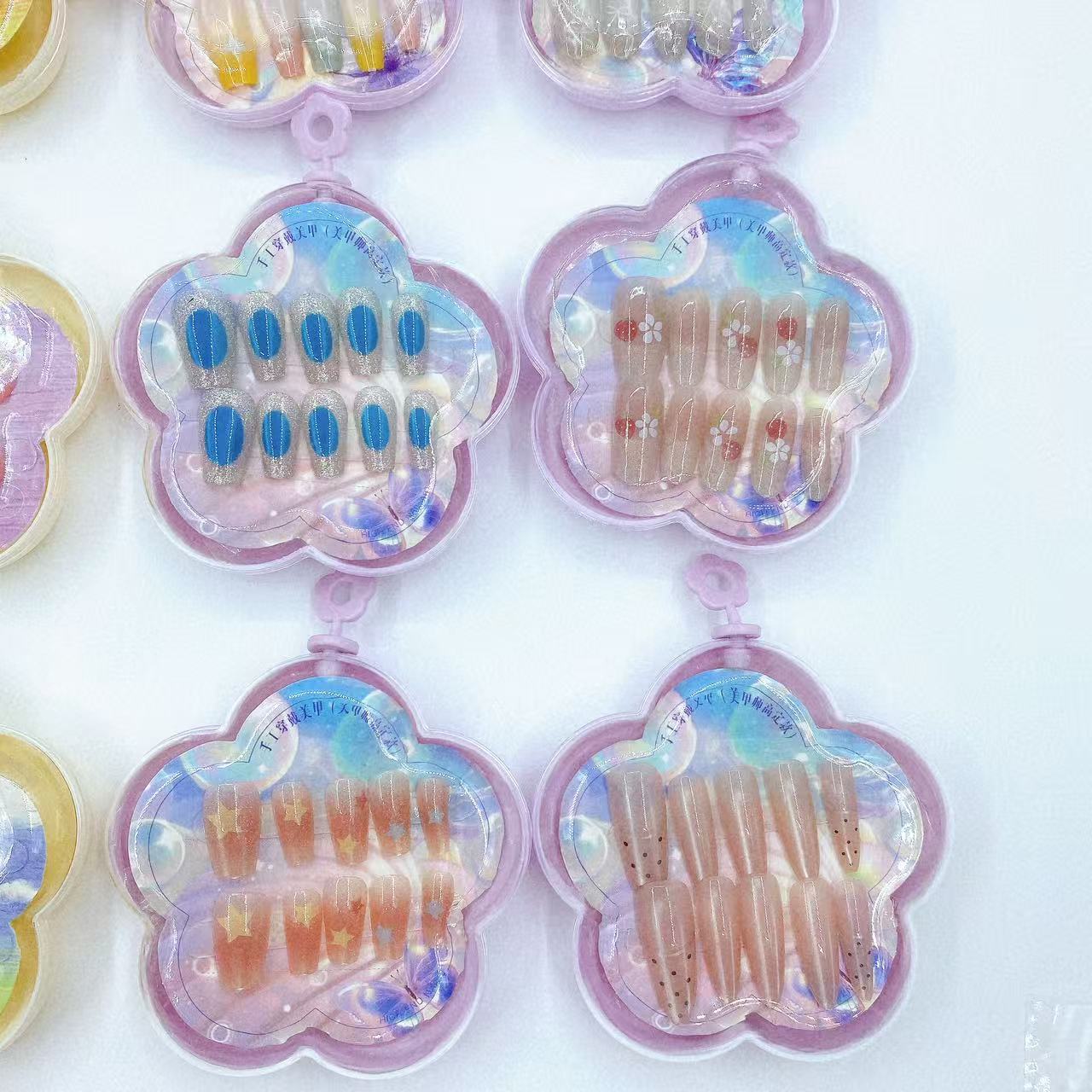 Juguetes para niños de manicura para usar uñas pegatinas de uñas hechas a mano para niñas pequeñas pegatinas de uñas largas y cortas desmontables productos terminados al por mayor