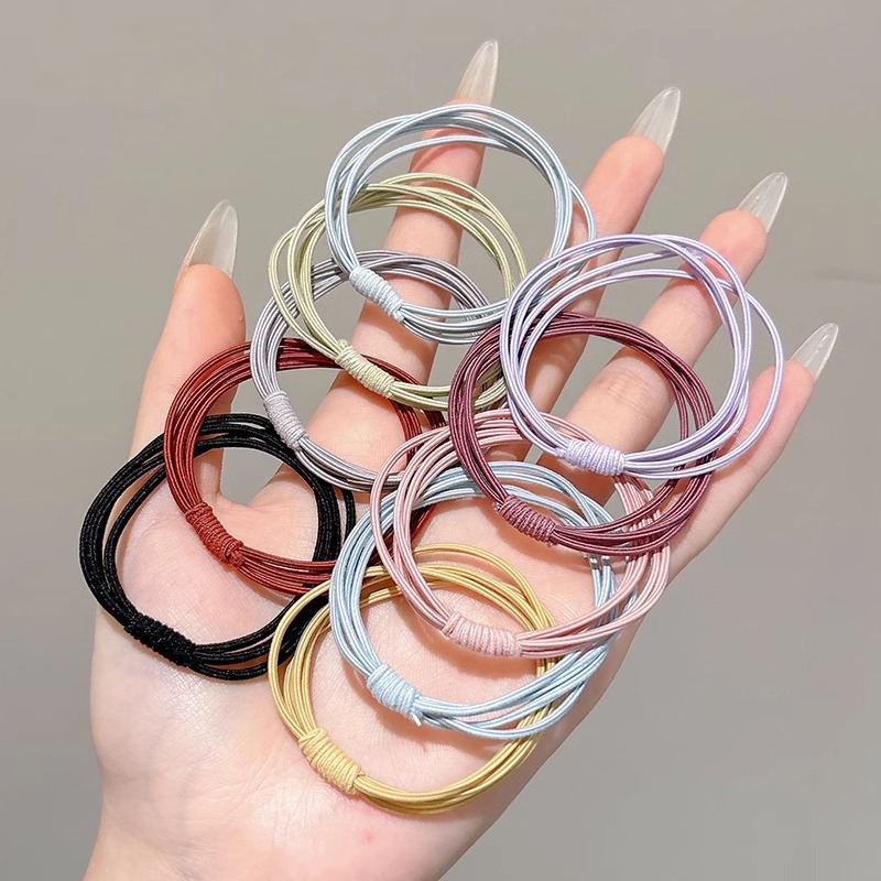 Cuerdas de cabeza de alta sensación multi-círculo de goma cuerdas de cabello de cabello de cola de caballo de alto anillo de cabello de alta elasticidad cubierta de cuero al por mayor