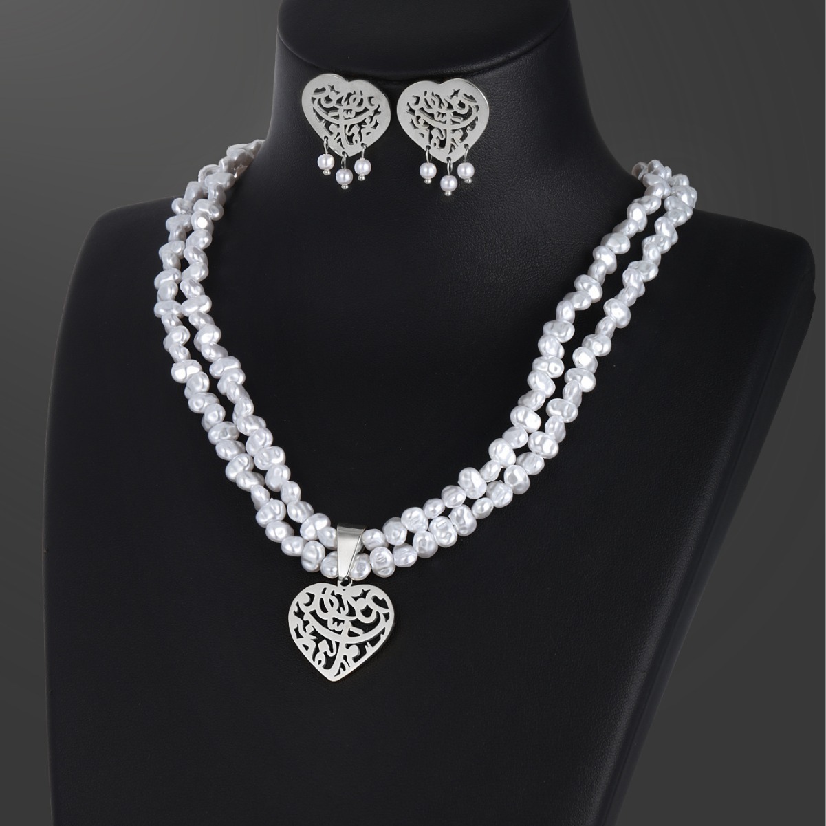 Xuping joyería de acero inoxidable amor perlas collar conjunto de otoño y invierno de moda europea y americana pendientes retro para mujeres