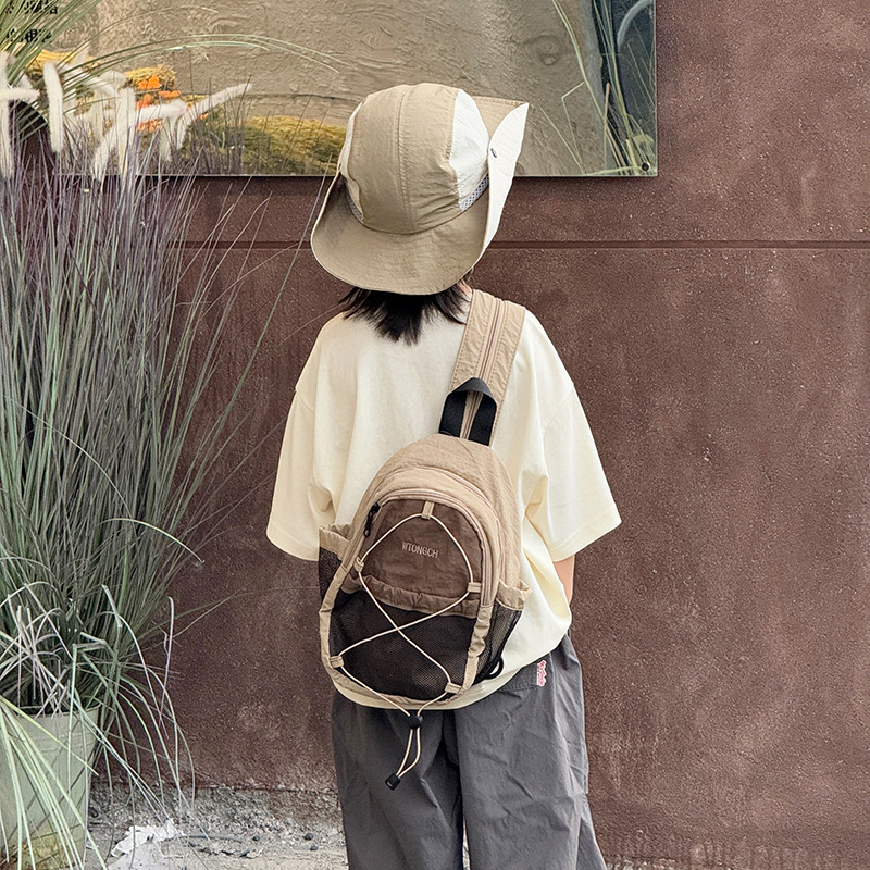Mochila coreana para niños y niñas, estilo extranjero, bolsas escolares de color contrastante, nueva mochila multifuncional para niños.