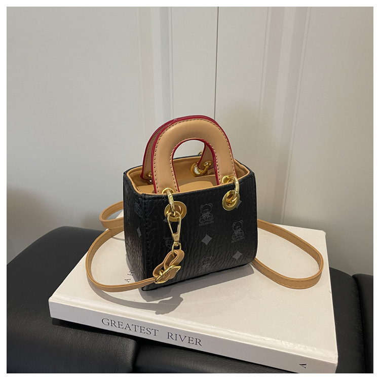 2026 nuevo bolso infantil caricatura lindo oso impresión bolso de hombro de moda mini bolso de bebé