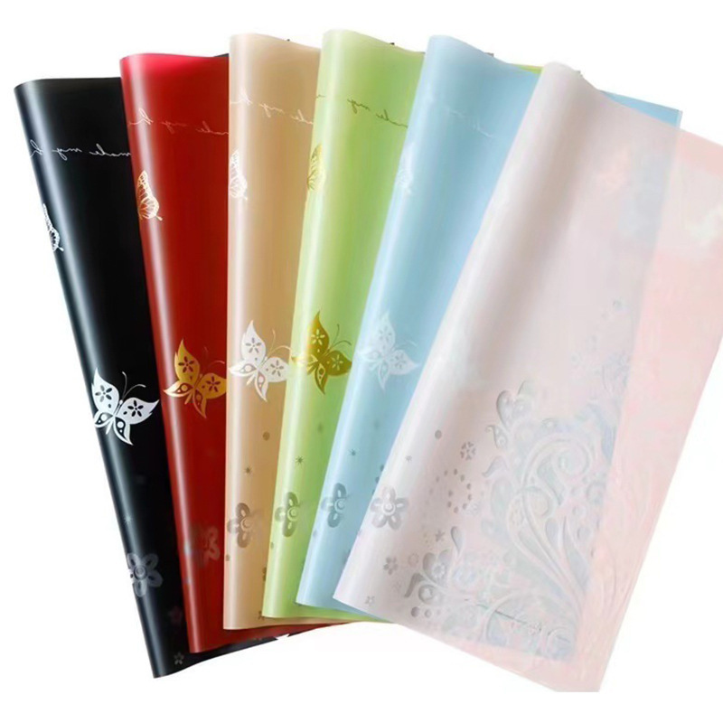 Flores fábrica de fiesta al por mayor nuevos productos transfronterizos mariposa hueca flor florista embalaje de papel impermeable material de embalaje ramo