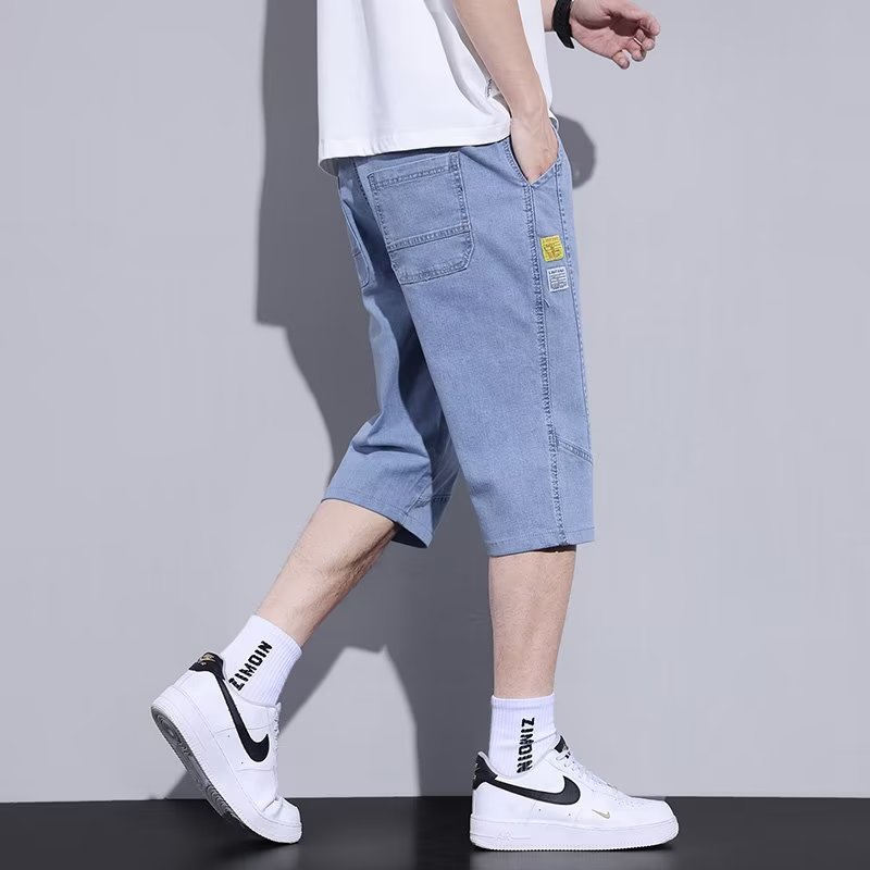 Moda de mezclilla de verano tendencia de los hombres sueltos rectos tallas grandes pantalones recortados marca de moda de los hombres pantalones medios de 7 puntos estilo fino de verano