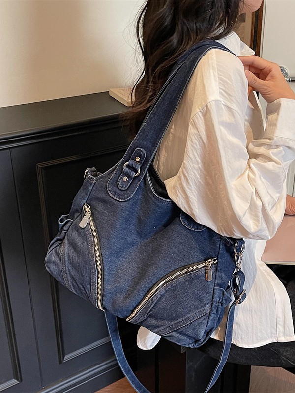 Bolsa de locomotiva de denim 2026 nuevo retro de gran capacidad de textura de lujo ligero bolso de hombro bajo la axila
