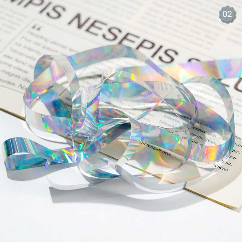 Nuevo arte de uñas transfronterizo cielo estrellado papel 1CM en caja Aurora papel de caramelo celofán arte de uñas joyería láser cielo estrellado papel