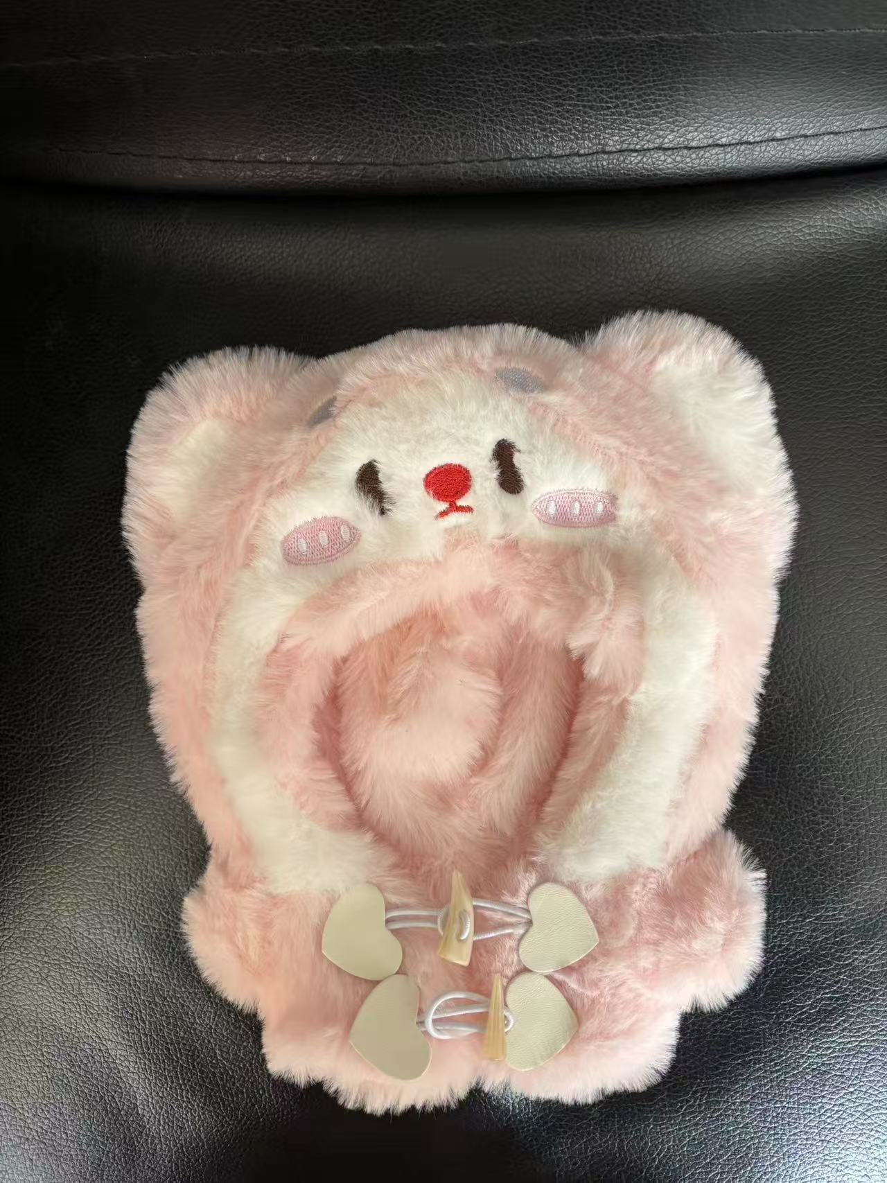 Fuchsia doll, cat