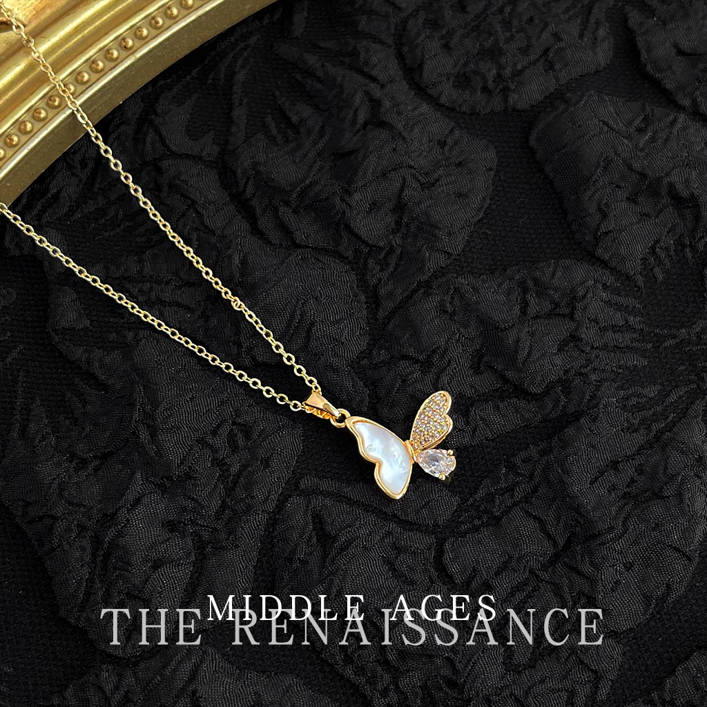 Vintage full shell butterfly
Light antique style real shell necklace electroplated with 18K real gold