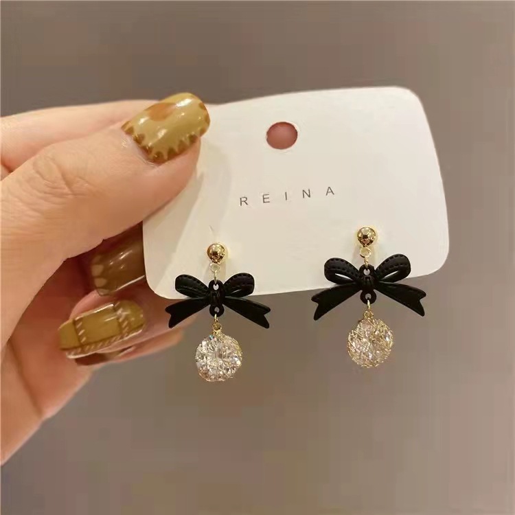 Demi-season elegant earrings with bow