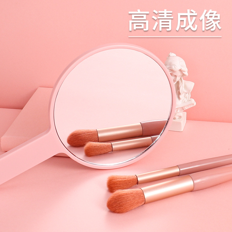 Espejo de Mano Redondo para Maquillaje Portátil con Mango de Plástico image 4
